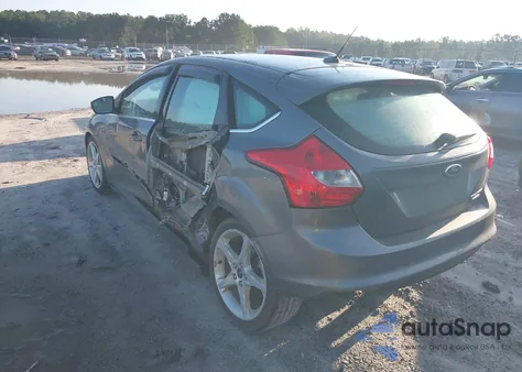 2012 Ford Focus Titanium z USA, uszkodzony, nr VIN 1FAHP3N20CL472573